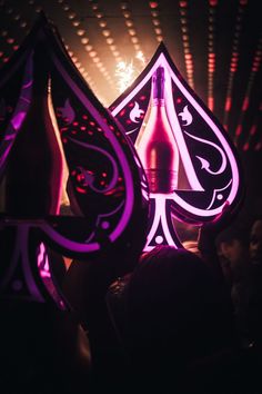 A nightclub bottleshow with models holding Ace of Spades champagne bottles in purple display cases. Ace Of Spades Champagne, Club Design Interior, Aesthetic London, Free Psd Flyer Templates, City Vehicles, Free Psd Flyer, Elegant Hotel, Psd Flyer Templates, Graphic Design Flyer