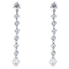 Alex Jona elegant and essential diamond earrings featuring 14 beautiful, G color, VVS1 clarity, diamonds of different shapes, weighing 2.24+0.27 carats, pierced and purely assembled by platinum links, made in Italy. Dimensions: H 1.37 in x W 0.19 in x D 0.1 in - H 35 mm x W 5 mm X D 3 mm. Alex Jona jewels stand out, not only for their special design and for the excellent quality of the gemstones, but also for the careful attention given to details during all the manufacturing process. Alex's pas Elegant Pouch, White Gold Drop Earrings, Yellow Gold Drop Earrings, Crystal White, Diamond Drop Earrings, Diamond Drops, Antique Diamond, Gold Drop Earrings, Rock Crystal