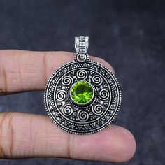 Valuable Natural Peridot Gemstone Pendant Necklace, 925 Sterling Silver, Peridot Jewelry, August Birthstone, Anniversary Christmas Gift SET-3073 Item Description:- * Gemstone : Peridot * Main Stone Creation : Natural * Stone Shape : Round * Stone Category : Cut * Stone Polish : High * Pendant Length:- : 1.75 Inch * Metal : 925 Sterling Silver Shipping Details: We will ship your parcel in 1-2 business days Under Free Economy Shipping we will ship your parcel via Indiapost or Dhl E-commerce and it May Birthstone Jewelry In Silver With Peridot, Round Peridot Stone Jewelry, Round Peridot Jewelry With Stones, Silver Peridot Jewelry For May Birthstone, Silver Peridot Jewelry With Gemstone, Green Peridot Jewelry Stamped 925, Sterling Silver Lime Green Gemstone Jewelry, Lime Green Sterling Silver Gemstone Jewelry, Lime Green Gemstone Jewelry In Sterling Silver