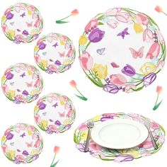 the tableware is decorated with butterflies and flowers