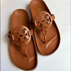 Brand New Will Be Shipped In Original Box Size 7.5 Comes From A Pet-Free & Smoke-Free Home Feel Free To Ask Any Questions Designer Brown Sandals With Cushioned Footbed, Tan Sandals With Leather Footbed And Round Toe, Tan Sandals With Leather Footbed, Tan Leather Sandals With Round Toe, Designer Brown Sandals For Vacation, Tan Leather Sandals With Flat Heel, Chic Tan Round Toe Sandals, Designer Brown Closed Toe Sandals, Designer Tan Sandals With Round Toe