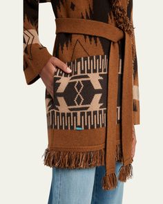 Alaniu icon jacquard cardigan sweater with fringe trim    Shawl collar    Long sleeves    Side slip pockets    Selftie belt    Relaxed fit    Cashmere    Made in Italy Jacquard Cardigan, Tie Dye Cardigan, Fringed Belt, Fringe Cardigan, Belted Cardigan, Womens Tie, 10 22, Cashmere Cardigan, Fringe Trim