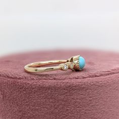 This beautiful ring features a bezel set east west turquoise gemstone of 0.73 carat with milgrain detail and natural earth mined diamonds, all set in solid 14K gold. This ring can be lovely December birthstone gift for your loved ones! This ring is made with solid 14K Gold and natural Earth mined SI / G-H diamonds. As listed, this ring is ready to ship. If you're interested in purchasing this setting with a different center stone please message us! Designer Silver Jewellery, Jewelry Showcases, Birthstone Gifts, December Birthstone, Natural Earth, Beautiful Ring, East West, Earring Findings, Pendant Bracelet