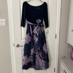 Gorgeous Hi Low Party Dress Navy Blue And Pale Purple Nwt Purple Midi Dress For Wedding Guest, Elegant Purple Floral Print Dress, Elegant Purple Midi Dress For Wedding Guest, Purple Midi Dress For Formal Occasions, Purple Formal Midi Dress, Elegant Purple Dress For Wedding Guest, Elegant Purple Dresses For Wedding Guests, Purple Midi Dress For Spring Wedding Guest, Formal Purple Midi Dress