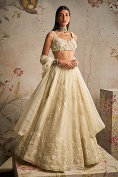 Ridhi Mehra | Grace Ivory Embroidered Lehenga Set | INDIASPOPUP.COM Classy Lengha, Organza Lengha, Ivory Bridal Lehenga, Sleeveless Lehenga, Cream Lehenga, Elegant Lehenga, Ivory Lehenga, Indian Fits, Indian Lengha