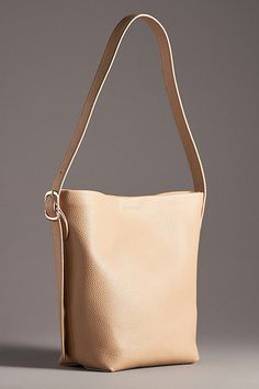 Polyurethane Removable zip-top pouch Magnetic closure Imported | Everyday Bucket Tote by Anthropologie in Beige, Women's, Polyurethane Bucket Tote, Leather Bucket, Pouch Bag, Green Bag, Blue Bags, White Bag, Magnetic Closure, Drawstring Bag, Spring Summer Fashion