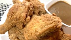 fried chicken and french fries on a white plate