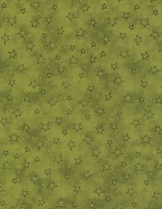 a green background with small stars on it