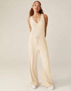 Jetsetter Jumpsuit | Beyond Yoga Chic Ribbed Jumpsuits And Rompers For Spring, Casual Ribbed Jumpsuits And Rompers For Lounging, Ribbed V-neck Jumpsuit For Loungewear, Stretch Ribbed Jumpsuits And Rompers For Loungewear, Chic Ribbed Jumpsuits And Rompers For Summer, Chic Solid Ribbed Jumpsuits And Rompers, Midi Jumpsuit, Yoga Apparel, Before Running