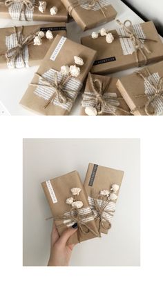 several wrapped presents sitting on top of each other in brown paper and tied with twine