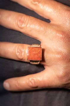 PRODUCT FEATURES: 925 Sterling Silver Red Coral Hardness, 3-4 Gemstone Family, Phylum Cnidaria Made from Coral Phylum Cnidaria Cruelty-Free Authentic Coral Mined in, Mediterranean The Sterling Silver Red Coral Signet Ring features a 925 Sterling Silver band complete with an etched criss-cross design on both sides of the ring band. Designer's Notes: Coral is believed to be a prized substance carrying sacred properties and symbolism. Coral signifies modesty, wisdom and, happiness along with these Silver Signet Rings, Cnidaria, Silver Signet Ring, Cross Design, Sterling Silver Mens, Mens Luxury, Cross Designs, Sterling Silver Bands, Ring Band