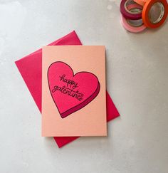 a valentine's card with the words happy valentine written on it next to some spools of thread