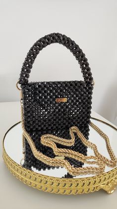 Handmade black color acrylic bead design bag. The product is made of first class material. It is a product that can accompany your special days and nights and attract all attention. It is a product produced to order. Luxury Black Bag With Pearl Handle, Black Handheld Bags With Pearl Handle, Black Handheld Bag With Pearl Handle, Black Square Bags For Party, Square Evening Bag With Chain Strap, Trendy Black Rectangular Evening Bag, Luxury Black Beaded Evening Bag, Elegant Black Beaded Bags, Black Handheld Shoulder Bag Gift