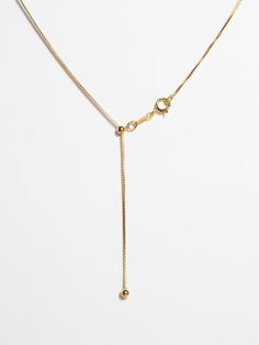 One necklace, infinite lengths. The lariat slides to adjust to for all layering needs. Lariat chain easily adjusts to any length up to 22” Immediate and easy slide adjustment Classic Long Drop Lariat Necklace With Adjustable Chain, Minimalist Adjustable Lariat Chain Necklace, Classic Lariat Necklace With Adjustable Chain, Adjustable Yellow Gold Box Chain Necklace, Adjustable Delicate Lariat Necklace, Adjustable Gold Lariat Necklace For Everyday, Everyday Lariat Link Necklace With Adjustable Chain, Everyday Adjustable Link Necklaces, Adjustable Classic Yellow Gold Chain Necklace