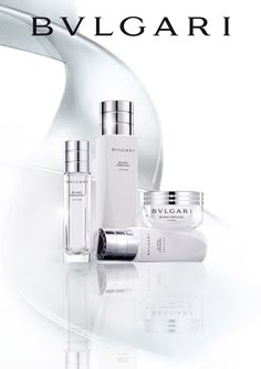 the advertisement for bvlgari is shown with three bottles and two containers on it