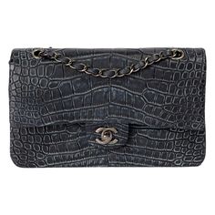 This unique and highly desirable Chanel item is skillfully crafted from navy leather. The double-flap bag has a spacious compartment and two interior pockets, offering plenty of room. The bag features a leather chain strap that can be worn as a cross-body or shoulder bag. The bag includes its original dust bag and box. The bag is in excellent condition with minor signs of wear. All items have been previously used and present some signs of wear unless marked as 'unworn'. Please refer to the many Chanel Double Flap, Navy Chanel, Hermes Kelly Bag, Perfect Handbag, Shopping Chanel, Navy Leather, Chain Shoulder Bag, Vintage Chanel, Classic Flap