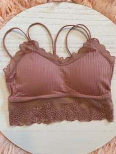 Lace Trim Bralette - Works for an everyday bra, or if you're wearing an off the shoulder top and going for a fun look! Comes in White, Tan & Mauve One-Size - Removable Padding Inserts Spring Stretch Cami Bra, Stretch Cropped Bra For Spring, Cropped Stretch Bra For Spring, Spring Cropped Stretch Bra, Spring Sports Bra With Removable Pads, Spring Cami Bra With Built-in Support, Spring Seamless Bra With Spaghetti Straps, Stretch Sports Bra With Removable Pads For Spring, Spring Cami Bra With Removable Pads