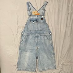 Levi's Short Light Blue Denim Overalls Men's Size Large Blue Straight Leg Overalls For Streetwear, Blue Denim Overalls For Streetwear, Casual Cotton Overalls With Belt Loops, Levi's Casual Overalls With Pockets, Casual Levi's Overalls With Pockets, Levi's Blue Jeans For Streetwear, Levi's Blue Summer Overalls, Casual Denim Overalls With Belt Loops, Levi's Medium Wash Cotton Jeans