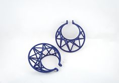 pair of blue hoop earrings on white background