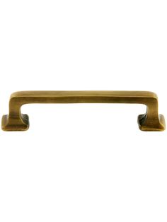 an antique brass pull handle on a white background