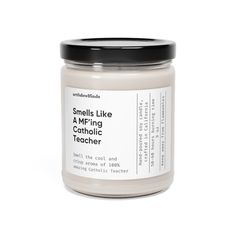 smells like a m - ring catholic teacher candle in white with black lid and label