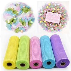 four rolls of colorful mesh fabric next to a wreath and other items that include hair clips