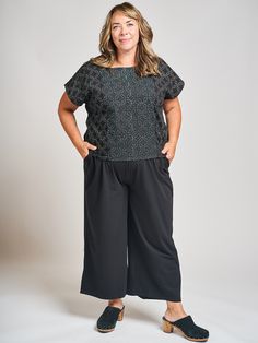 These elastic waist black pants combine comfort and fashion with an on trend wide leg silhouette. They maximize on comfort and fit, making the perfect WFH pant (though they hold their own in a real office, too!). 95% Organic Cotton 5% Spandex Pockets Elastic waist Made fair trade in India by one of our longstanding production partners Versatile Black Wide Leg Pants With Pockets, Black Wide Leg Workwear Pants With Elastic Waistband, Black Wide Leg Pants With Elastic Waistband For Work, Black Wide Leg Pants For Work With Elastic Waistband, Black Wide Leg Pants For Business Casual, Versatile Black Pull-on Pants, Black Wide Leg Pants For Work, Casual Black Wide Leg Pants For Work, Black Relaxed Fit Wide Leg Ankle-length Pants