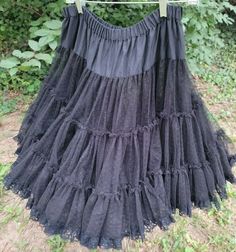 Fluffy, feminine, black square dance petticoat/slip/crinoline made of a dotted tulle edged in 1" wide lace. This is really a petticoat that's meant to be seen. It's so pretty. I think you could turn this into a skirt by itself depending on what you wore under it. Two layers of 3 rows.  From the Great American Square Dance Company. Guessing it's a medium or small. See measurements.  Hand wash/Line dry. This has been laundered. Elastic feels a little stretched out, but still has plenty o Square Dance, Square Dancing, Dance Company, Black Square, Petticoat, So Pretty, Black Lace, Tulle Skirt, Hand Wash