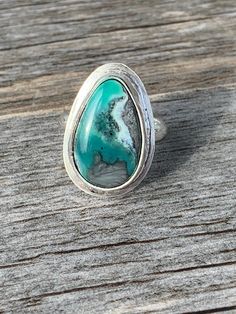 "This gorgeous mystic sage turquoise and variscite stone is settled into a simple sterling silver setting. This stone is so amazing and it didn't need much, as it speaks for itself! Ring size is 5 1/4\". All handmade jewelry will have natural imperfections, and honestly thats what gives each piece their alluring details, originality and soulful nature. Because of this, my pieces are created to be as unique as you are, with no two exactly alike. Please check out my Instagram for videos and pictur Bohemian Chrysoprase Turquoise Ring, Bohemian Turquoise Chrysoprase Ring, Handmade Sterling Silver Turquoise Ring For Healing, Healing Sterling Silver Turquoise Ring, Spiritual Sterling Silver Turquoise Ring With Natural Stones, Spiritual Turquoise Ring With Natural Stones In Sterling Silver, Bohemian Turquoise Chrysocolla Ring With Natural Stones, Bohemian Chrysocolla Turquoise Ring, Bohemian Turquoise Ring With Chrysocolla