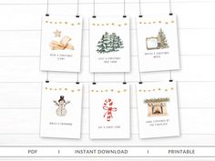 six christmas cards hanging on a string with the words instant printable and images below them