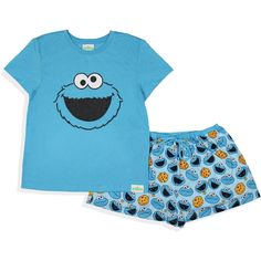 This pajama set is a playful and cozy ensemble that brings the joy of Sesame Street's lovable characters, Elmo and Cookie Monster, right into your bedtime routine. Designed for comfort and fun, this pajama set is perfect for adults who cherish the magic of Elmo's world. It is made of 100% polyester for a comfortable fit. Wash cold and tumble low to maintain the vibrant colors of the pajama set. The pajama is a short and top set. Multicolor Cotton Sleepwear With Cartoon Print, Fun Multicolor Cartoon Print Sleepwear, Playful Summer Sleepwear With Character Print, Playful Printed Blue Sleepwear, Playful Blue Printed Sleepwear, Casual Character Print Sleep Sets, Cotton Sleepwear With Character Print In Multicolor, Casual Sleep Sets With Character Print, Casual Bedtime Sets With Character Print