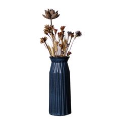 a blue vase with dried flowers in it