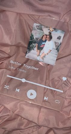 a pink sheet with an image of two people on it and the words, better together like controls