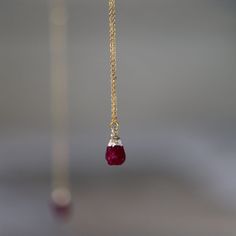 Raw Ruby Healing Crystal Necklace.  Real 18k Gold Plated Cable Chain with Gold Vermeil Raw Ruby Crystal Pendant.  Stunning Raw Crystal has been flash plated in 24K Gold. Various crystals - Turquoise  , Amethyst, Garnet,Sapphire .... see drop down menu for more options.  * Ruby is the birthstone for July  * Ruby is the gemstone to celebrate 40 years of marriage Necklace length is 17.5 inches with 1inch extension chain-to vary length. Pendant size varies from 12-16mm in height approx (including lo Spiritual Gold Necklace With Ruby, Spiritual Ruby Necklace Gift, Yellow Gold Ruby Birthstone Pendant Necklace, Handmade Ruby Spiritual Necklaces, Raw Ruby Necklace, 40th Wedding Anniversary Gifts, Ruby Necklace Pendant, 40th Wedding Anniversary, Ruby Crystal