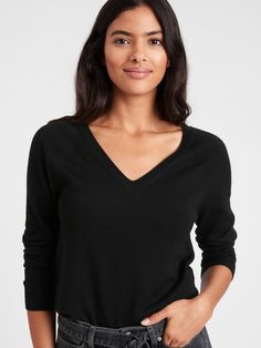 Seamless Merino V-Neck Sweater in Responsible Wool | Banana Republic Seamless V-neck Knit Top For Fall, Stretch Seamless V-neck Knit Top, Black Cashmere V-neck Top, Stretch Fine Knit V-neck Sweater, Fall Seamless V-neck Top, Seamless V-neck Fall Top, Seamless V-neck Tops For Fall, Stretch V-neck Knit Top, Seamless Stretch V-neck Knit Top