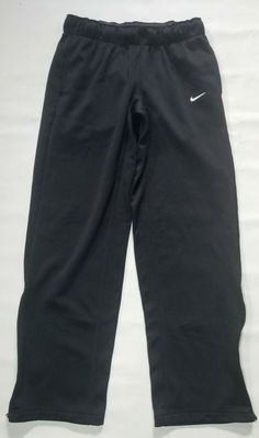 NIKE THERMA-FIT MEN'S ATHLETIC PANTS / SWEATPANTS SIZE: SMALL COLOR: BLACK UP FOR YOUR CONSIDERATION ARE A GREAT PAIR OF NIKE SWEATPANTS.  PANTS ARE IN EXCELLENT OVERALL CONDITION.  PANTS FEATURE HAND POCKETS, ELASTIC WAISTBAND w/ DRAWSTRING, AND ZIP UP OPEN HEM ANKLES. PLEASE SEE ALL PICS AND ASK ANY QUESTIONS PRIOR TO BUYING. THANK YOU FOR VISITING THROWBACK SPORTS APPAREL Nike Boys Track Pants, Black Go-dry Sweatpants For Gym, Black Go-dry Sweatpants For The Gym, Nike Full-length Sports Joggers, Nike Full Length Sports Joggers, Nike Black Functional Sweatpants, Functional Black Nike Sweatpants, Nike Moisture-wicking Sweatpants For Sports, Black Sweatpants For Training And Sports Season