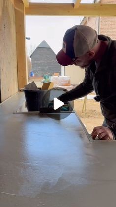 a man is working on some kind of table