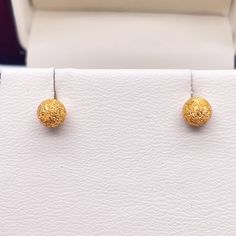 22ct Yellow Gold Sparkly Round Glitter Ball Stud Earrings Can be worn everyday and on special occasions like weddings and partys. Great Gift for her on Valentines Day, Birthdays, Mothers Day or a Anniversary Gift  Metal: 22K (916) Yellow Gold Total Gold Weight: 1.6gm Earring Head Size: 5mm Post Thickness: 1.10mm Fastening : Screw Back   Packaging : Elegant Box  Shipping Free in UK Shipping World Wide : See Policy Returns Policy : 14 Days Hassle Free Returns for 100% Refund   To try this item Or View More from our collections  Please Visit Our North West London Showroom Formal Gold Diamond Cut Cluster Earrings, Party Earrings In Yellow Gold With Diamond Cut, Party Yellow Gold Diamond Cut Earrings, Yellow Gold Diamond Cut Earrings For Party, Gold Cluster Earrings For Celebrations, Gold Cluster Earrings For Formal Occasions, Dazzling Sparkling Cluster Earrings As Gift, Sparkling Round Diamond Earrings For Party, Gold Sparkling Earrings Gift