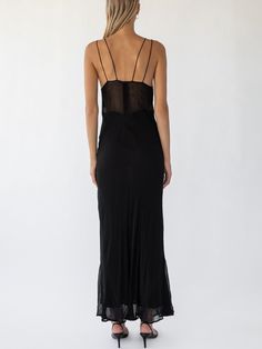 Stunning classic black maxi dress with sheer empire panel and double strap design. Cut on the bias and slightly sheer fabric. Measurements: 0 (XS): Bust 32.5"-33.5" Waist 24"-25" Hips 34"-35" 1 (S): Bust 34"-35" Waist 25"-26" Hips 35"-36" 2 (M): Bust 35"-36" Waist 26"-27" Hips 36"-37" 3 (L): Bust 36"-37" Waist 27"-28" Hips 37"-38" 100% Viscose, dry clean only Black Rose Dress, Rose Dress, Black Maxi, Sheer Fabric, Strap Design, Sheer Fabrics, Black Rose, Black Maxi Dress, Classic Black