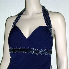 #2042 Color On Tag: Navy Beaded Halter Neckline Pleated Bodice Built-In Bra Beaded Embellishment Beneath Bodice Hidden Back Zipper Closure Split Skirt At Side Seam Low Back 92% Polyester 8% Spandex Lining: 100% Polyester Fitted Halter Neck Dress With Beaded Straps, Fitted Blue Dress With Beaded Straps, Blue Fitted Dresses With Beaded Straps, Blue Party Dress With Beaded Straps, Fitted Blue Halter Neck Evening Dress, Dress Thrift, Halter Strap Dress, Doll Brooch, Split Skirt