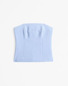 Elevate your wardrobe with the Abercrombie & Fitch Women's Tailored Tube Top, a perfect blend of sophistication and modern style. This strapless top is designed to flatter with its slim fit and corset-style seaming details that accentuate the bodice.

- Size: Large
- Color: Light Blue Stripe
- Material: Polyester, Elastane
- Gender: Female
- Age Group: Adult

Crafted from a high-quality blend of polyester and elastane, this top ensures both comfort and durability. The light blue stripe pattern a Blue Stripes Pattern, Top Light, Menswear Inspired, Corset Style, Athletic Fits, Women's Tops, Favorite Jeans, Tube Top, Jacket Tops