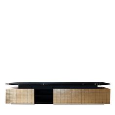 a black and gold entertainment center with two doors on one side, drawers on the other