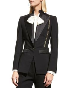 DOLCE&GABBANAMixed-Media Logo Tape Tuxedo Jacket. Size 46. $3245. Dolce&Gabbana tuxedo jacket in wool and satin combo with logo selvedged details and logo buttons Stand collar with wide lapels; single-breasted front Long sleeves; button cuffs Front welt pockets Tailored fit Center-back vented hem Wool/silk/polyester Made in Italy Model is 5'10"/177cm. Online Inquiries: NMS21_B6MXJ Store Inquiries: #4145603 Unique Tuxedos, Long Cardigan Coat, Dolce Gabbana Jacket, Tuxedo Women, Overcoat Jacket, Media Logo, Belted Jacket, Cotton Blazer, Tuxedo Jacket