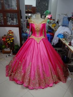 SLeeping Beauty - Pink Adult Dress . Aurora Costume Adult - Custom Costum in your size Costume make with bodice corset with lace up back It's will take 2-3 weeks for done . And 3-4 days for shipping to delivery to you Dress have no including hoops skirt in the price For the measurements please follow in this measurement chart link : https://www.etsy.com/uk/listing/520335138/custom-measurement-add-on?ref=shop_home_active_9 The numbers is need for the measurement is : 1,5,7,9,10,11,12,13,14,15,24, Sleeping Beauty Dress, Aurora Costume, Sleeping Beauty Costume, Disney Princess Cosplay, Adult Dress, Disney Princess Costumes, Girls Ball Gown, Aurora Dress, Pink Ball Gown