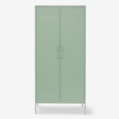 a green metal locker with two doors