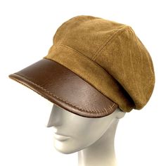 Baker boy cap made of cotton velour and genuine brown leather visor. Inspired by the early 20th century newspaper delivery boys. Its large visor protects us from the sun, cold and rain. The length of the visor is 6 centimeters. The interior is made of a cotton lining The back of the cap has a small eco-leather belt to adjust the measurement up to three centimeters less. For its production we use top quality real leather, reinforcements to give consistency to the hat and top sewing threads. In ou Classic Brown Baseball Cap, Leather Flat Cap Hat For Fall, Leather Flat Cap For Fall, Brown Fall Baseball Cap For Outdoor, Retro Brown Beret For Fall, Brown Retro Beret For Fall, Classic Brown Baseball Cap For Outdoor, Vintage Brown Beret For Winter, Brown Winter Baseball Cap