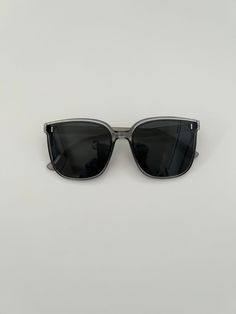 Elevate your style with these chic black square sunglasses for women. The perfect accessory for any outfit, these sunglasses are a must-have for any fashion-forward individual. With a sleek and modern design, these sunglasses are perfect for any occasion. Crafted with high-quality materials, these sunglasses are durable and built to last. The square frames are a timeless classic, and the black colour adds a touch of sophistication to any look. Whether you're running errands or lounging by the po Black Square Sunglasses, Sunglasses For Women, Black Square, Black Colour, Square Frames, Timeless Classic, Eyewear Sunglasses, Running Errands, Square Sunglasses