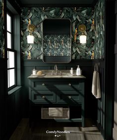 a bathroom with green wallpaper and wooden flooring, along with a large mirror above the sink