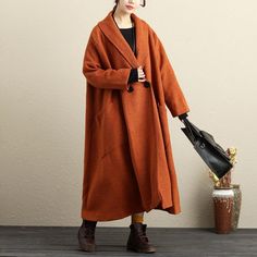 Material: woolen,polyester（lining：plant fibres）Collar type:othersClothing placket: one buttonPattern:plainStyle: casual,retroSleeve: long sleevesClothing details:buttons,pocketWaist: looseSeason:autumn,winterCombination:single pieceColor:yellow brown(caramel）M/L(Fit for EU 38-44,US8-14,UK12-18,AU12-18,NZ12-18)Length: 112.00 cm/ 44.09 "Bust: 156.00 cm/ 61.42 "Shoulder: 58.00 cm/ 22.83 "Sleeve length: 50.00 cm/ 19.69 "Arm: 38.00 cm/ 14.96 "Cuff: 30.00 cm/ 11.81 "Hem: Loose Waist: Loose PS:1.The me Brown Single Breasted Sweater Coat With Long Sleeves, Brown Single Breasted Sweater Coat, Casual Long Spring Wool Coat, Brown Long Sleeve Sweater Coat For Winter, Brown Single-breasted Long Sleeve Sweater Coat, Brown Wool Coat With Lapel Collar For Spring, Brown Sweater Coat For Spring Workwear, Brown Sweater Coat For Work In Spring, Oversized Brown Wool Coat For Work