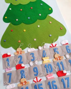 a felt christmas tree with numbers on it